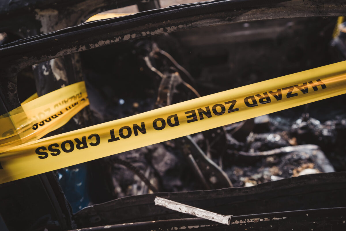 Palos Hills man killed after multi-car crash sends vehicle off roadway near Orland Square Mall. 2 London | UK - 2021.06.12: An abandoned, stolen burnt out blue car parked on the sideway parking spot?? tied with yellow do not cross stripe