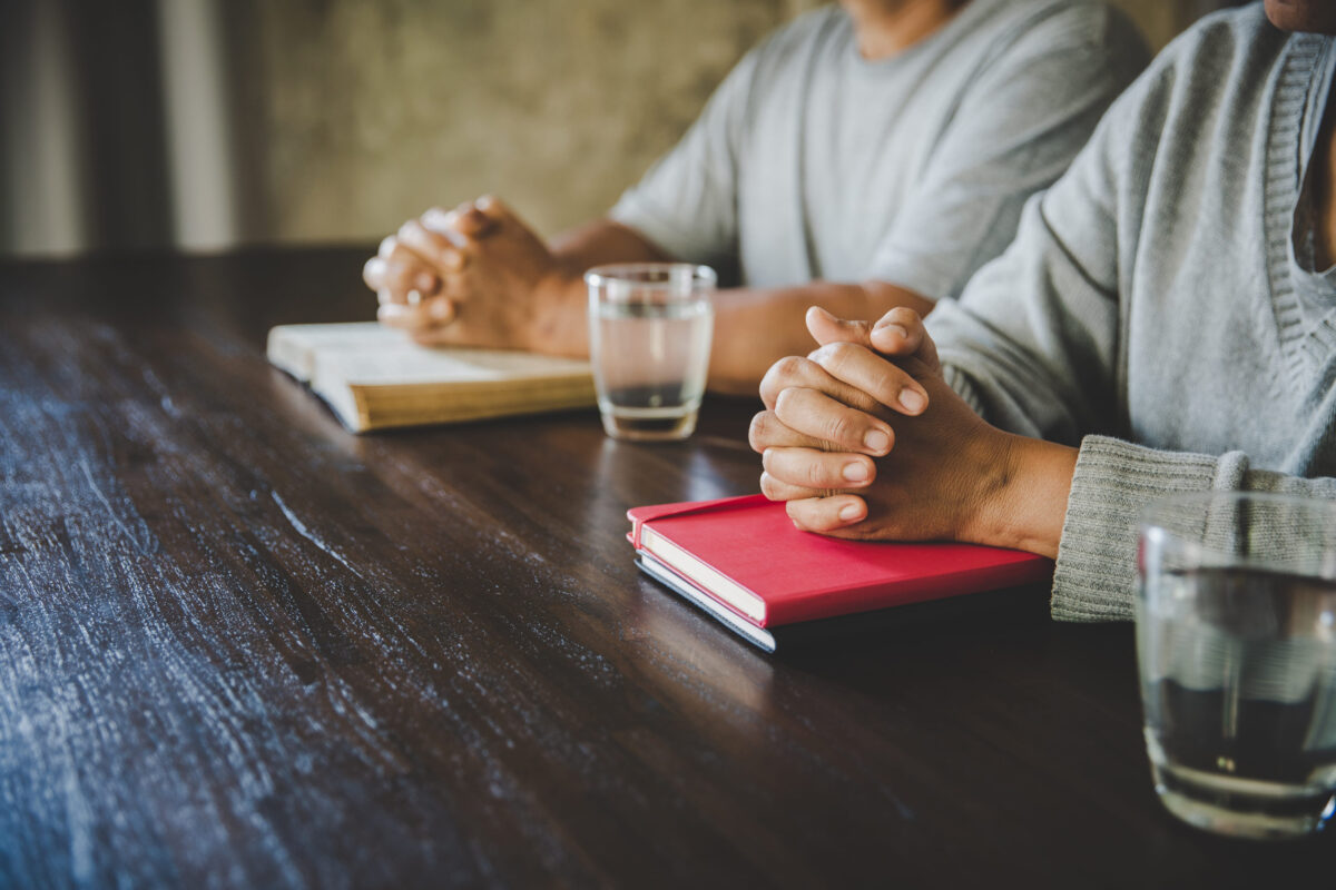 Darryl Strawberry Had Rings and Fame, but Says Only Christ Filled the Void 2 Group of people praying worship believe. soft focus, praying and praise together at home. devotional or prayer meeting concept.