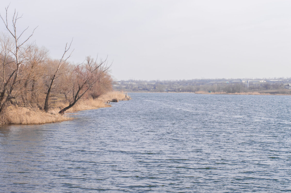 Newark Protesters Push for Faster Passaic River Cleanup as Long-Stalled Superfund Work Faces New Pressure 2 pond in autumn against a gray sky