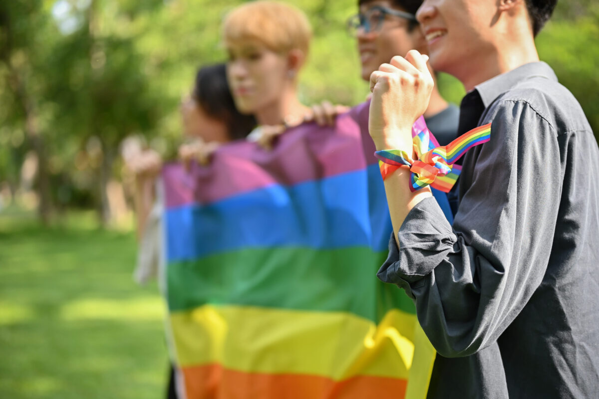 Why Was Berlin Attack Suspect Released? German Officials Question Decision as Court Defends Its Ruling 2 Close-up image of a group of diverse teen Asian friends joining the Pride Month parade, holding a rainbow flag, and celebrating Pride Month together. Diversity and LGBTQ concepts