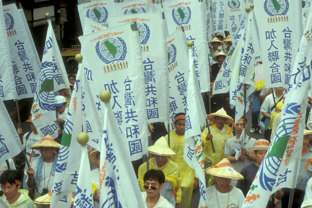 people on a protest for the right, Republic of Taiwan to join the UN, in the city center of Taipei in Taiwan of East Asia. Taiwan, Taipei, July, 1997