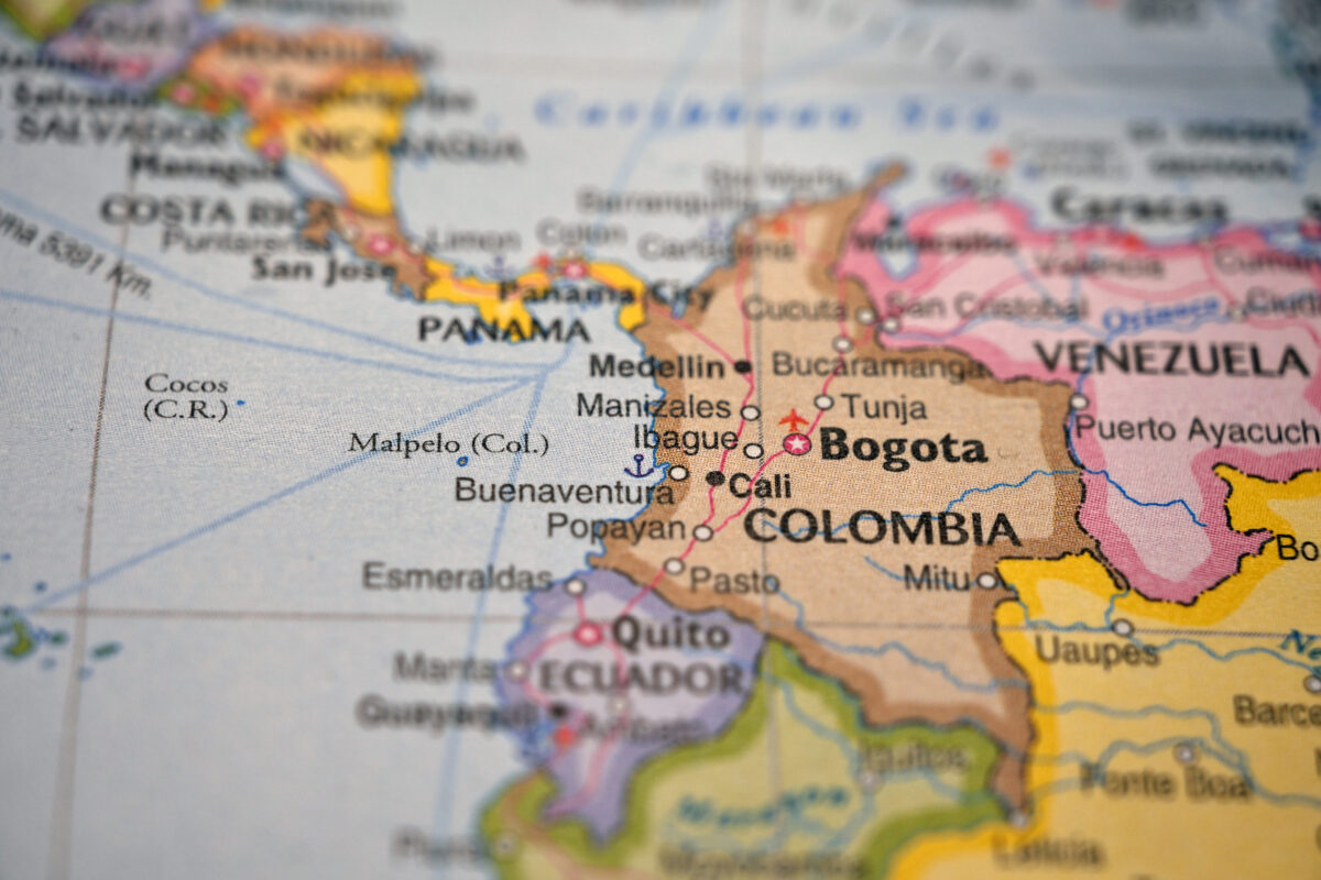 Ibague Location Highlighted on Blurred World Maps