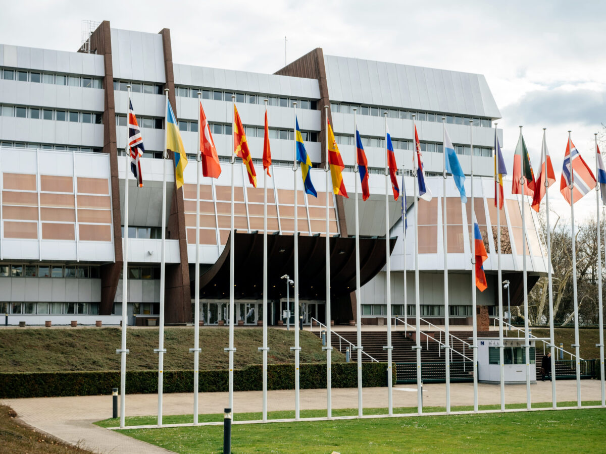 Rubio Vows to Dismantle the ICC as Trump Administration Escalates Sovereignty Fight 2 STRASBOURG, FRANCE - MAR 29, 2018: Aerial view of Flag of Russia flying half-mast at Council of Europe as a tribute and mourning of victims of fire at Zimnyaya Vishnya shopping centre Kemerovo