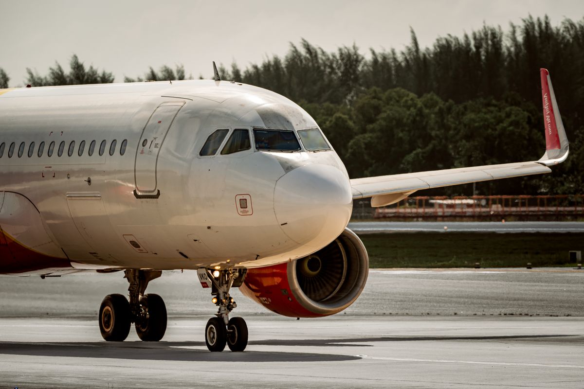 The Fighter Jet Race Is Changing as New Technology Redefines the Future of War 3 A commercial airplane on the runway preparing for takeoff during the day.