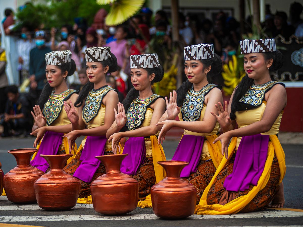 Colorful traditional dance performance in Kuningan, West Java showcasing vibrant costumes and cultural heritage.