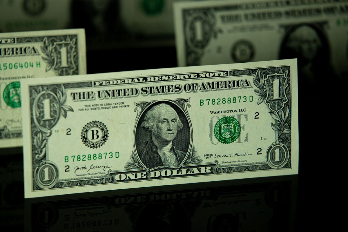 Trump Says U.S. Was ‘Disinvited’ as $4.7 Billion Gordie Howe Bridge Opens Into a 50% Tariff Fight. 2 Detailed shot of a one dollar bill highlighting currency and finance themes.