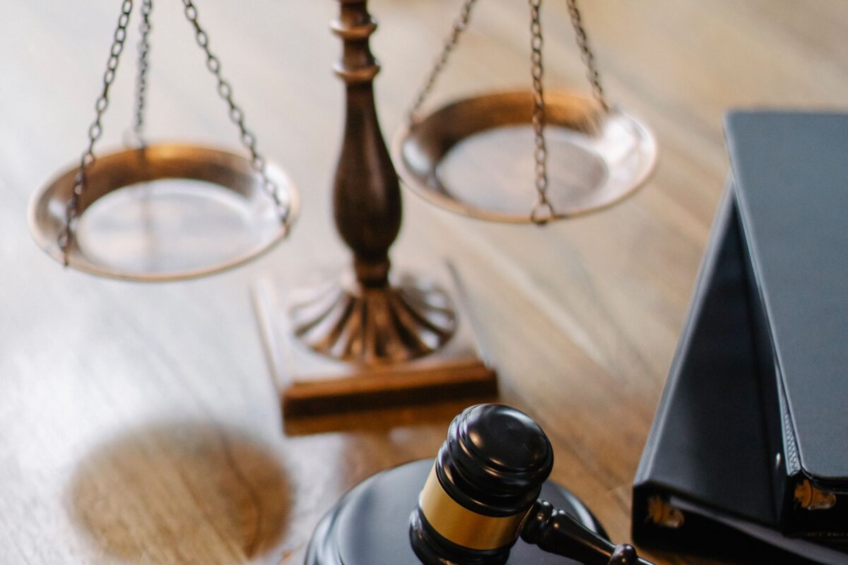 judges-desk-with-gavel-and-scales
