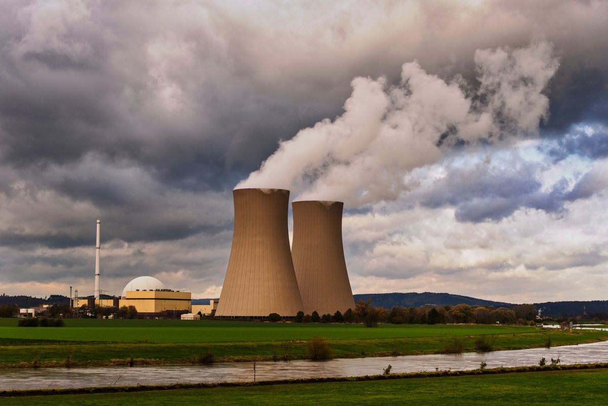 Top Iranian Commander Vows to Pursue Nuclear Weapons as Long as the U.S. Has Them, Triggering New Clash With Israel 1 Scenic view of a nuclear power plant with cooling towers emitting steam in Hameln, Germany.