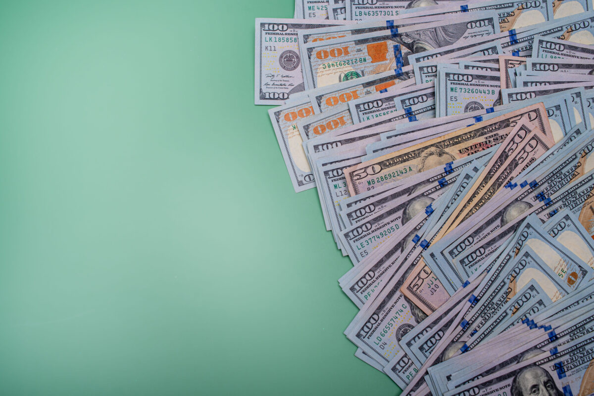 American dollars on a green background. The growth of the dollar. finance and banks.