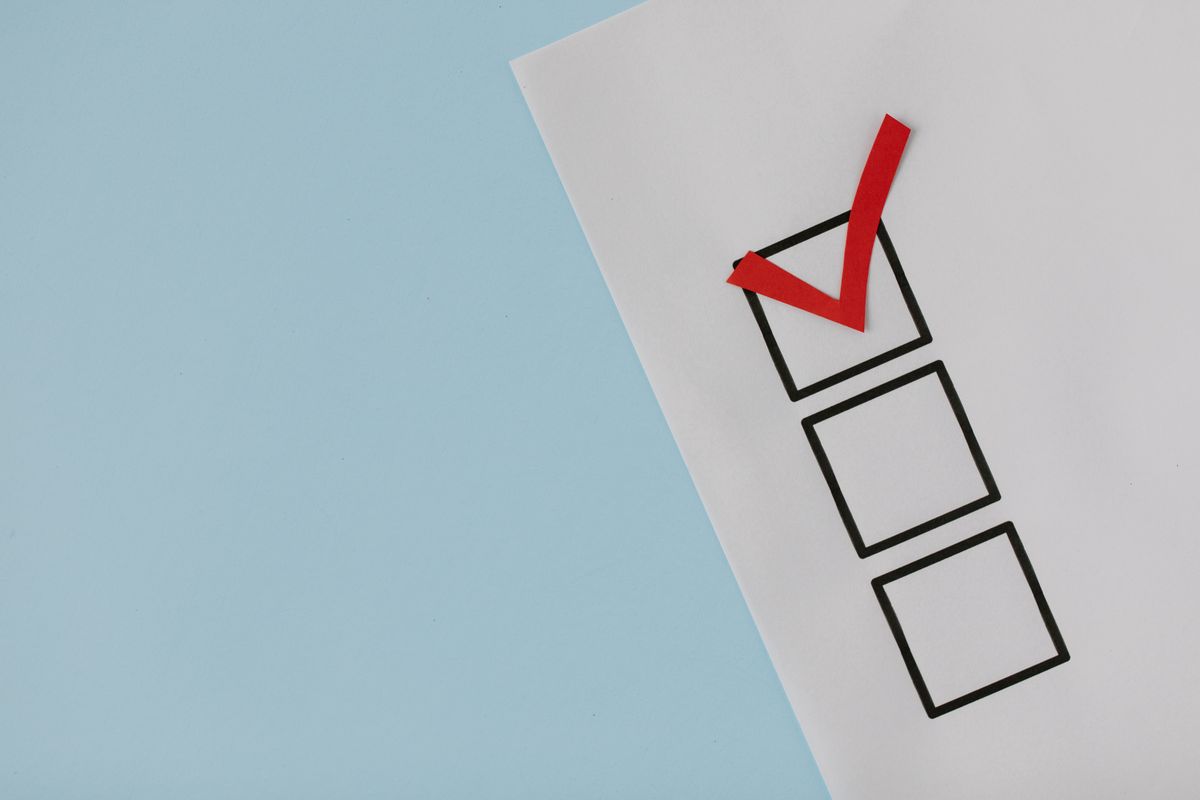 Trump Targets Lisa Murkowski After Her Vote Against Todd Blanche Exposes Deep GOP Divide 2 A simple white paper checklist with one red checkmark, ideal for concepts like completion or approval.