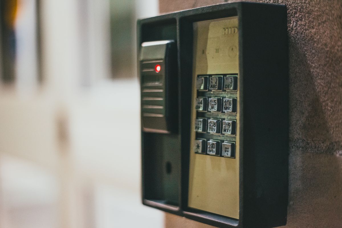 Cyberattacks Hit Water Systems in 7 States, Exposing a Dangerous Failure America Was Warned About 1 Close-up of a security access control keypad with illuminated buttons for keyless entry.