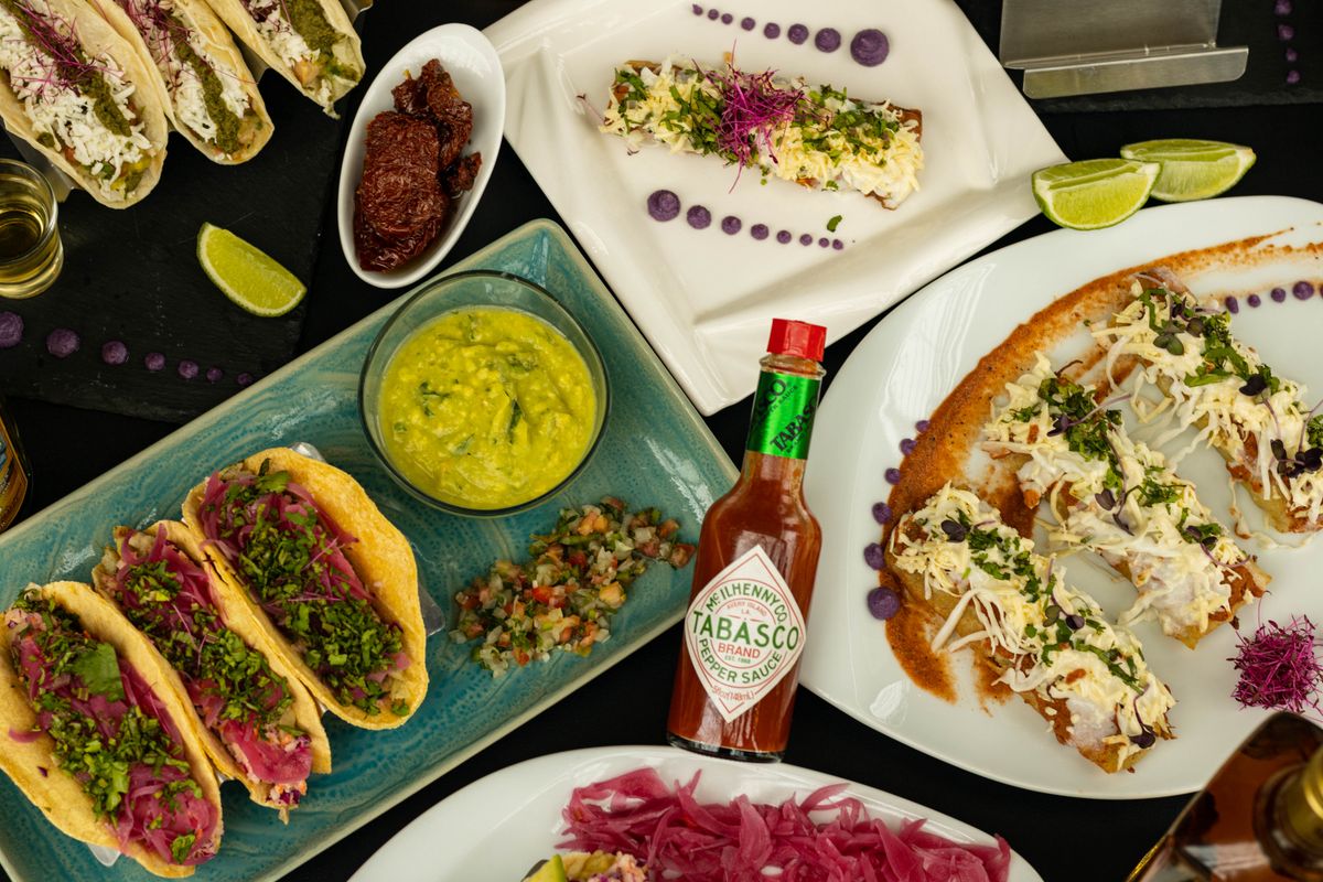 Jalapeño-Linked Salmonella Outbreak Sickens 345 People Across 27 States 2 Colorful Mexican taco spread with Tabasco sauce highlights delicious flavors.