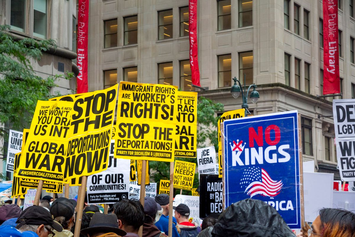 RFK Jr.’s CNN interview exposed a dangerous health crisis Americans cannot ignore 1 Vibrant protest with signs demanding rights and opposing deportations.