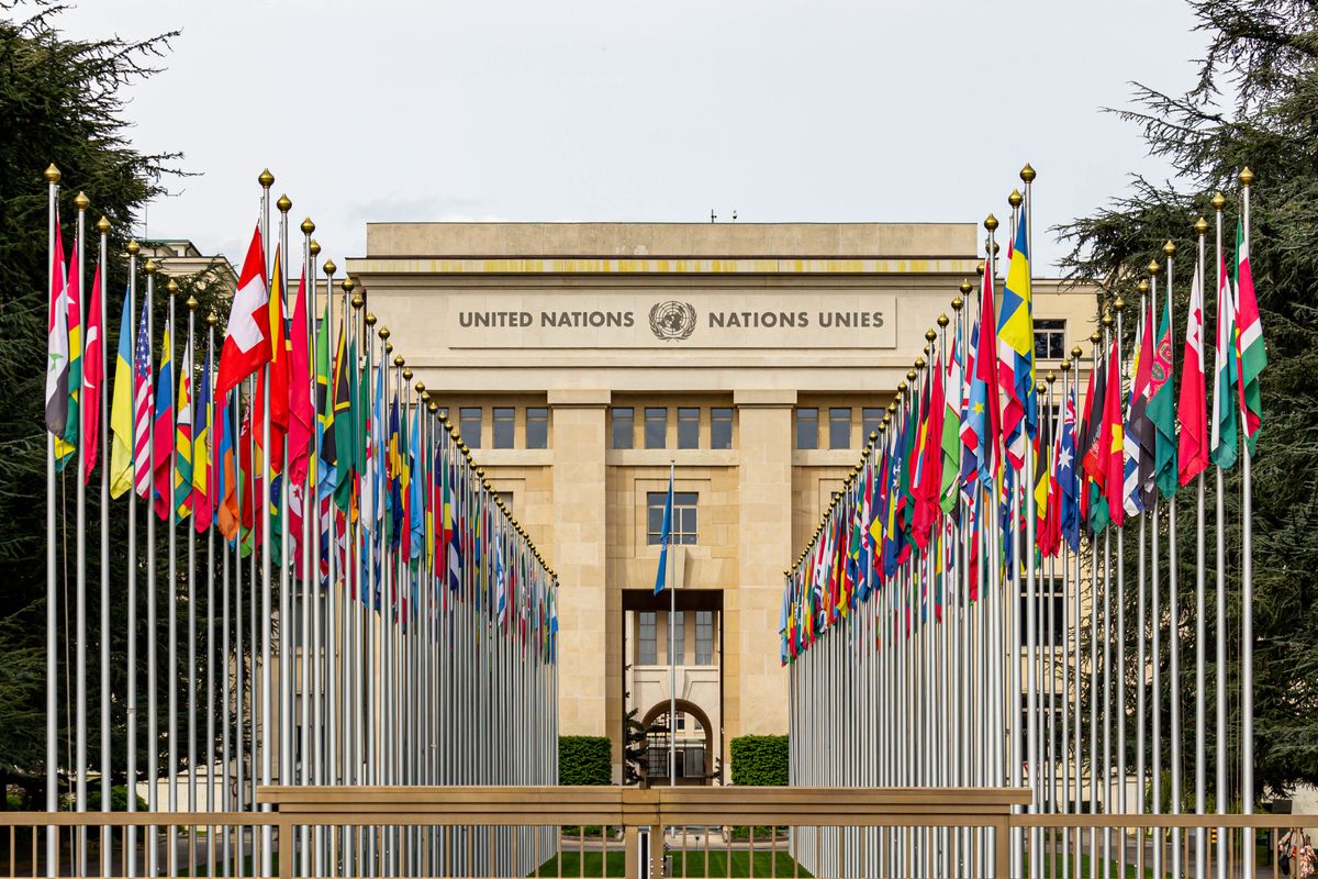 U.S. Military Searches for New Iran Pressure Tactics as Trump Faces a War With No Clear Ending 2 View of the United Nations Office in Geneva adorned with flags of various countries.