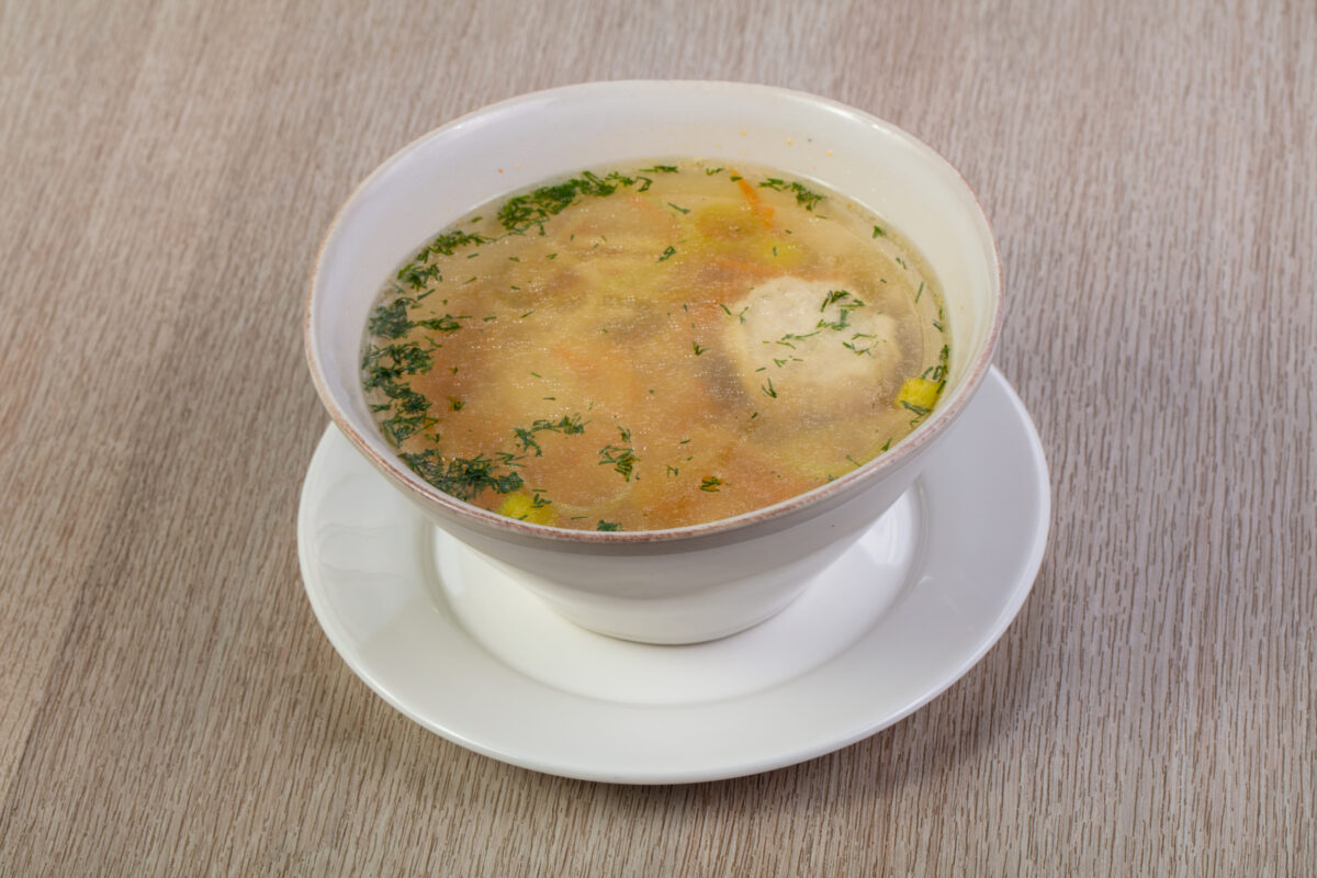 Chicken soup with noodles and herbs