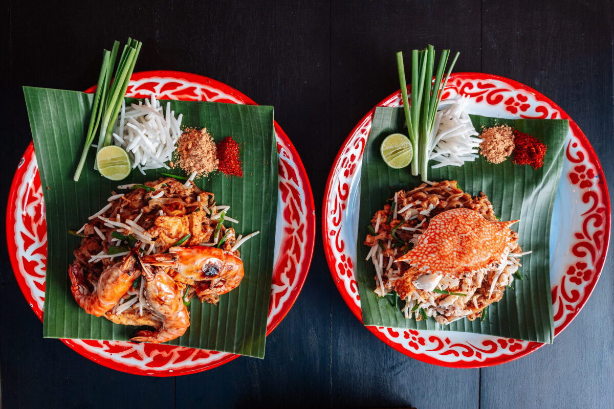 Prawn or Shrimp and Crab Pad Thai served with lime, scallions, bean sprouts. crushed peanut and chili powder.