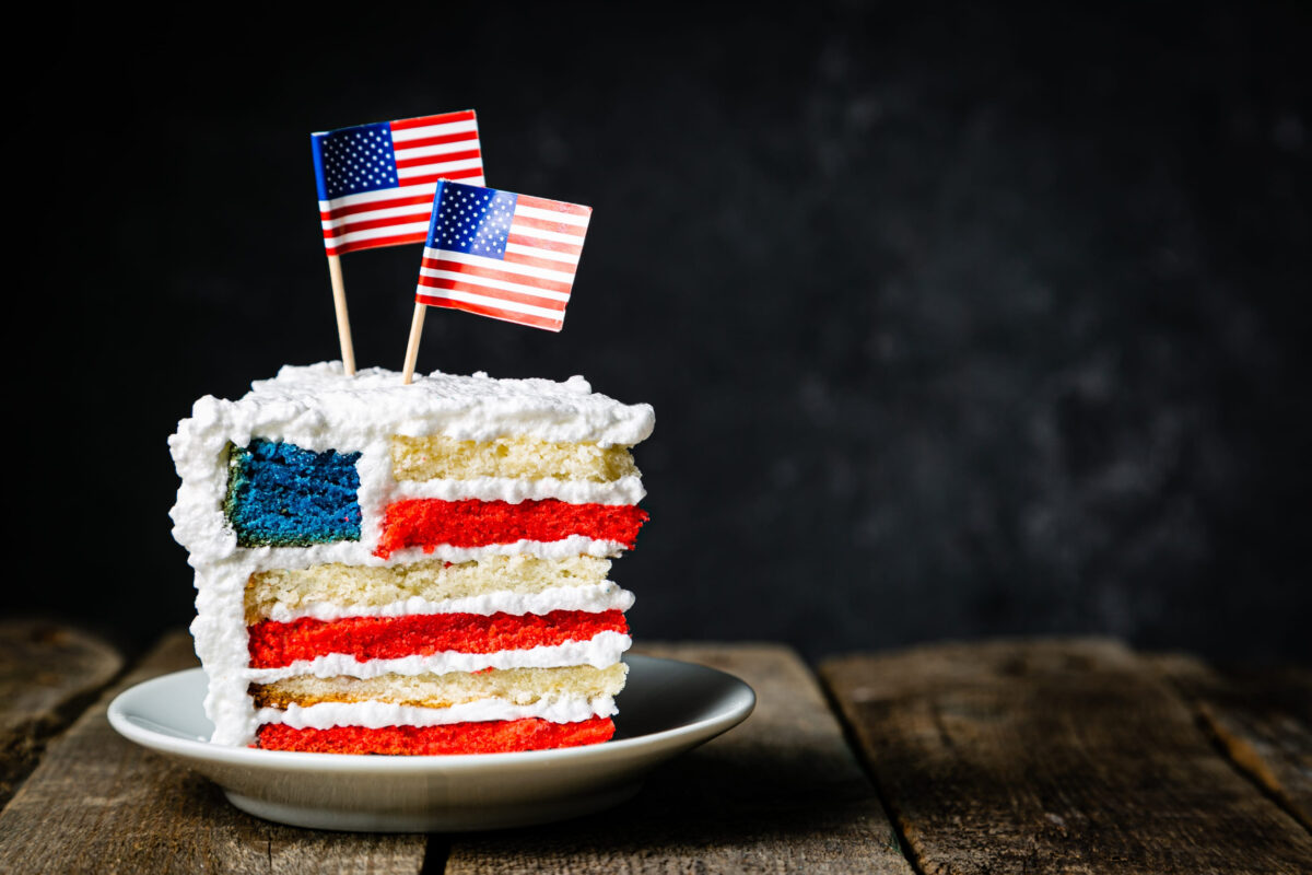 American national holidays concept - 4th of July, Memorial Day, Labour Day. Layered spounge cake in USA flag colours