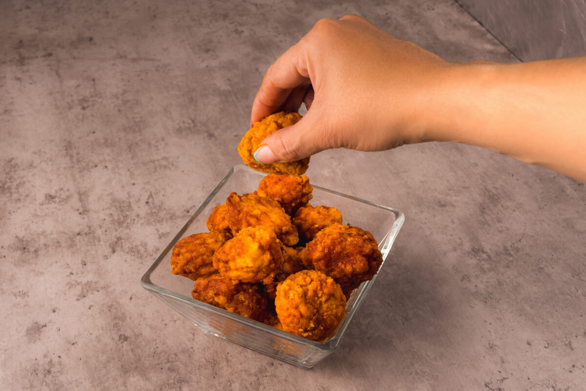 Check your kitchen: These six food recalls shoppers should know about this week. 3 Closeup of some chicken nuggets in a glass dish on a table ready to eat
