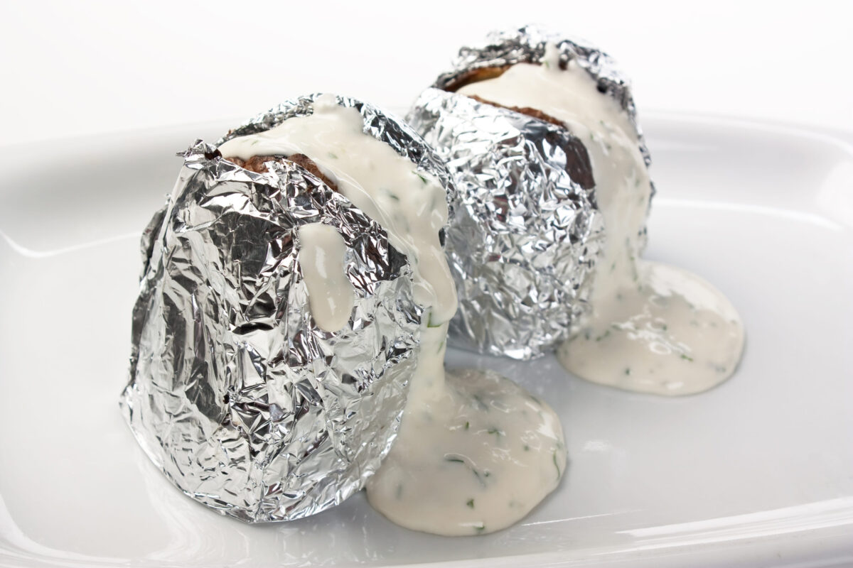 Stuffed potatoes in foil with spices