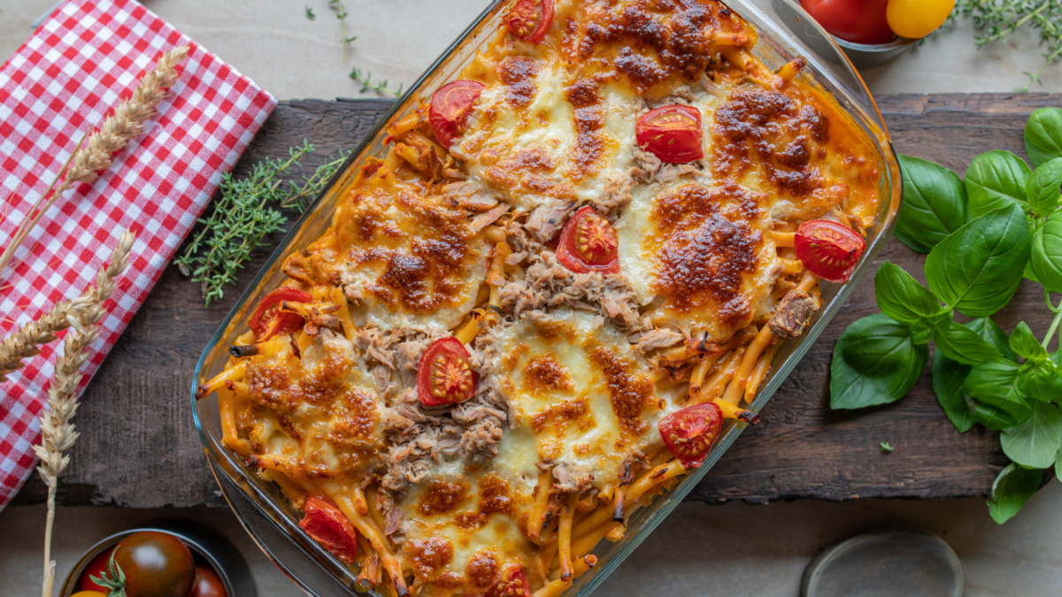 Tuna casserole or tuna pasta bake with macaroni noodles creamy tomato sauce and mozzarella cheese