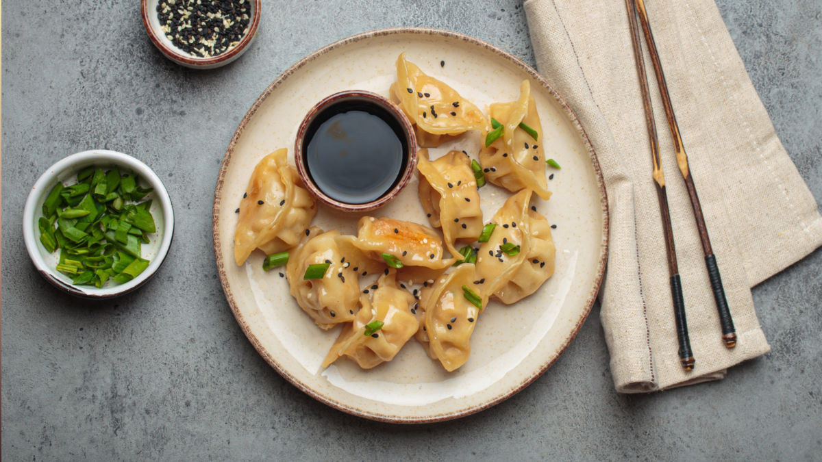 Gyoza dumplings soy sauce chopsticks asian Japanese food wontons