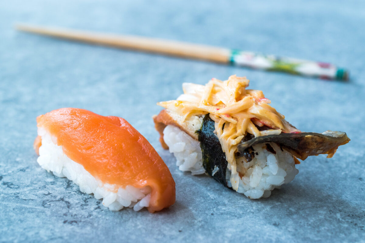 Sushi Set Sake and Unagi Nigiri with Chopsticks. Traditional Organic Food.
