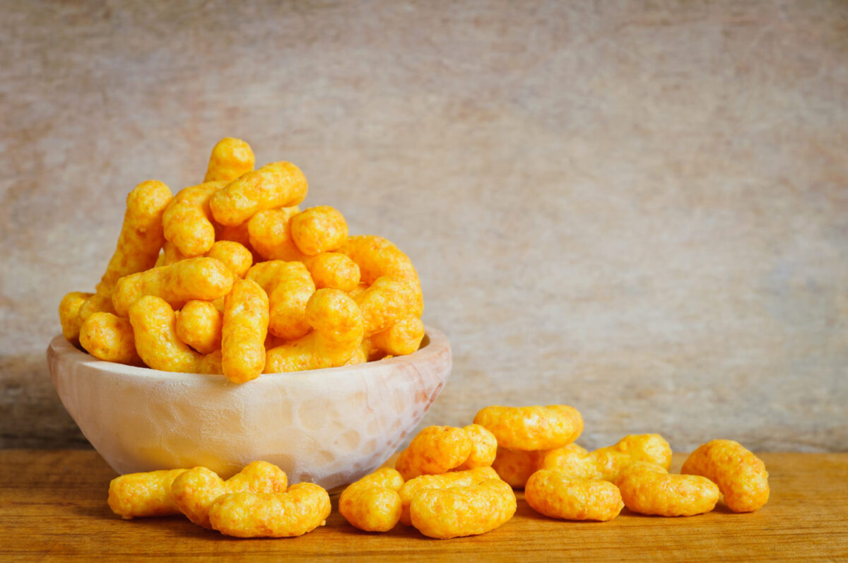 Bowl with cheese curls snack
