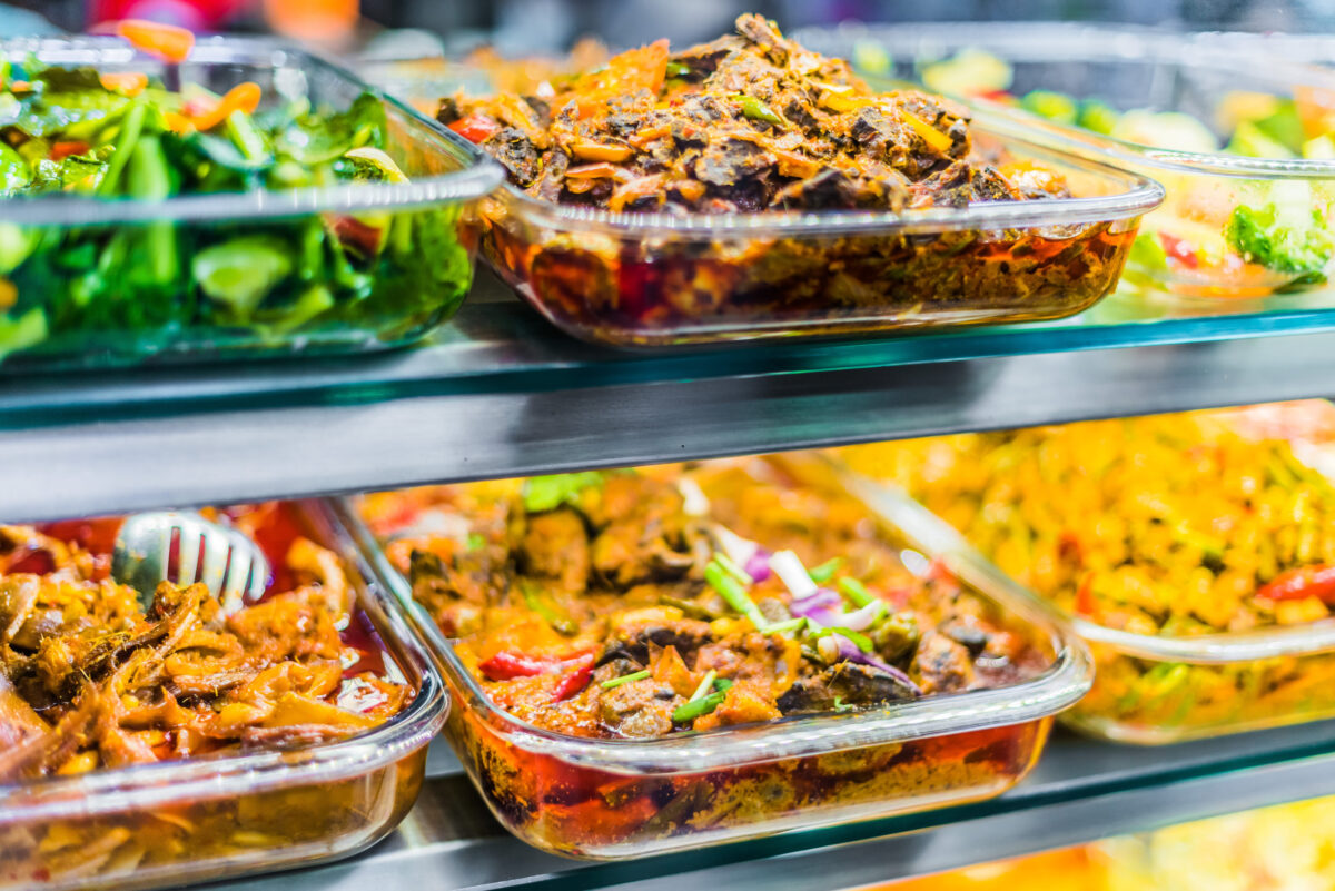 Traditional Asian dishes sold in a shopping mall food court
