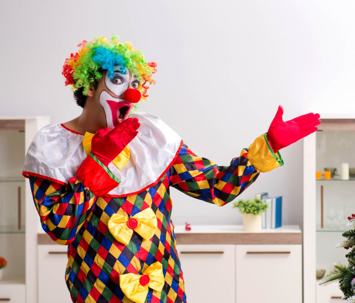 The funny clown in christmas celebration concept