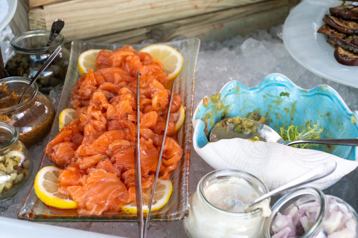 9 Things You Can't Legally Sell From Your Home Kitchen 2 Luxury catering by the pool, food bloggers event, banquet, wedding, festive, hotel brunch buffet arrangement with clean simple design, decorations, boat filled with ice. Modern design and decorations