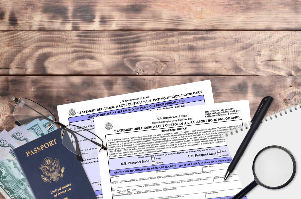 Department of State form DS64 Statement regarding a lost or stolen us passport book and or card lies on table and ready to fill. Paperwork during operations with US Passport concept