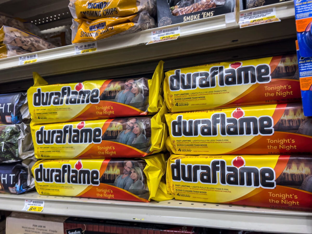 Woodinville, WA USA - circa May 2022: Angled view of indoor fire logs for sale inside a Haggen grocery store.