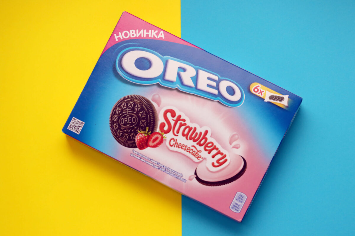 TERNOPIL, UKRAINE - MAY 28, 2022: Oreo strawberry cheesecake crispy cookie box. The brand Oreo is owned by american company Mondelez international