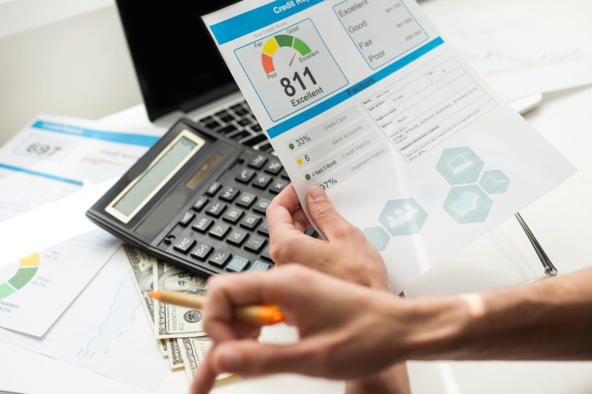 Credit Report with Score rating app on smartphone screen showing creditworthiness of a person for loan and mortgage application based on payment history and debt usage, budget management performance