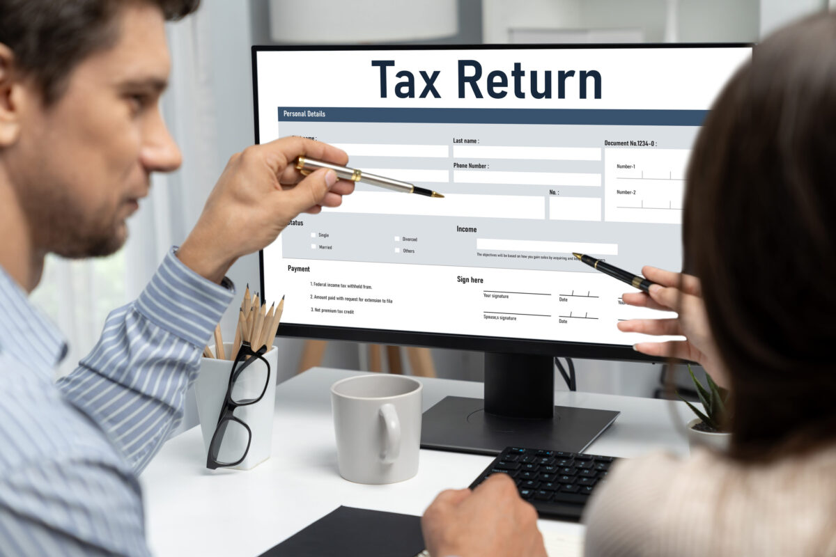 Online tax return form for submitting individual income tax return form brisk on the internet website. Government web for tax payment and return. Taxation technology concept.