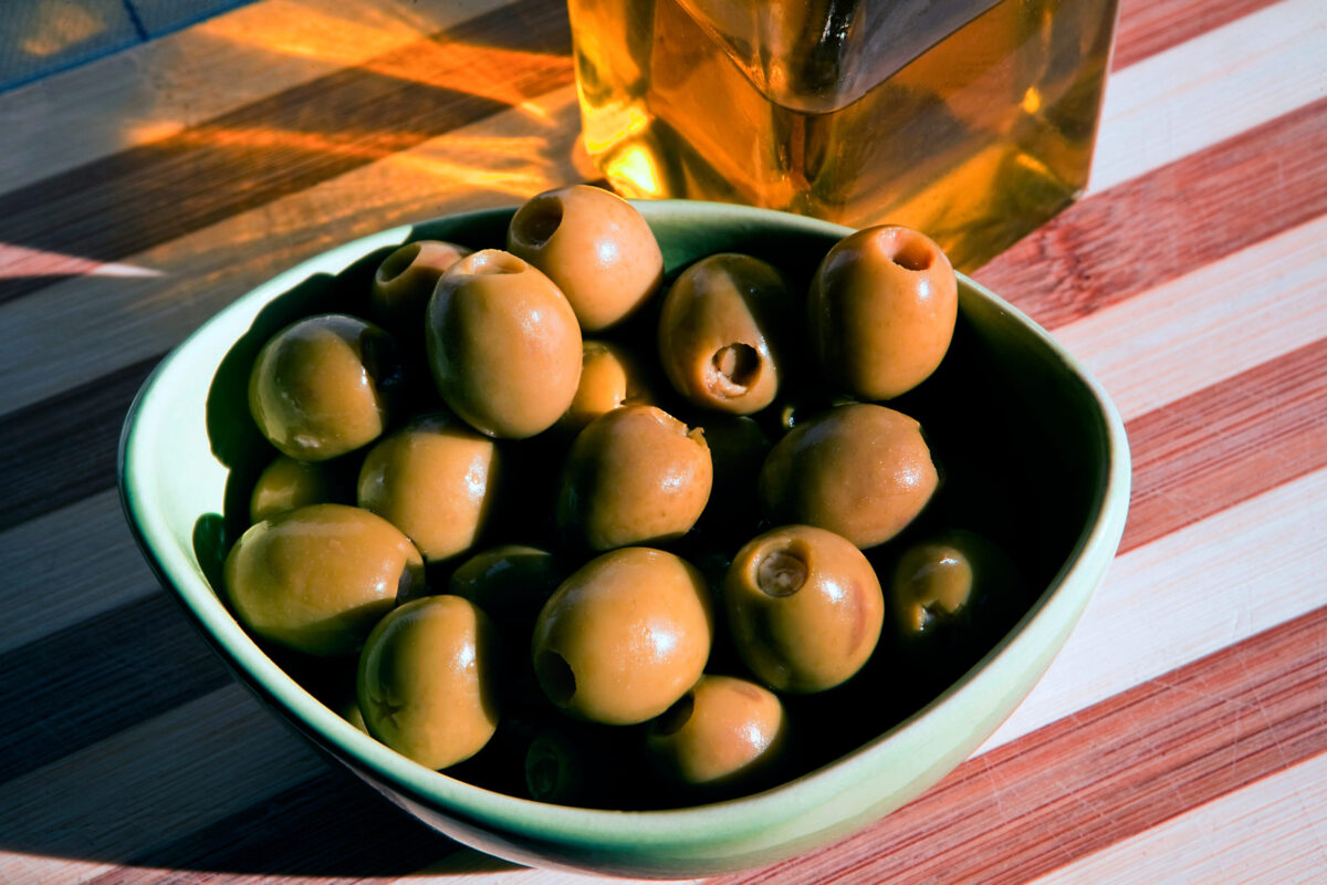 Bowl with green olives dressed, a typical product of Andalusia, Spain