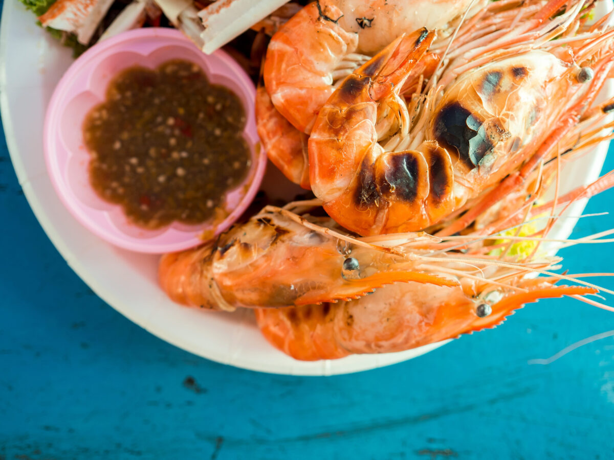 Steamed seafood set of shrimps and crabs with spicy sauce in Thailand.