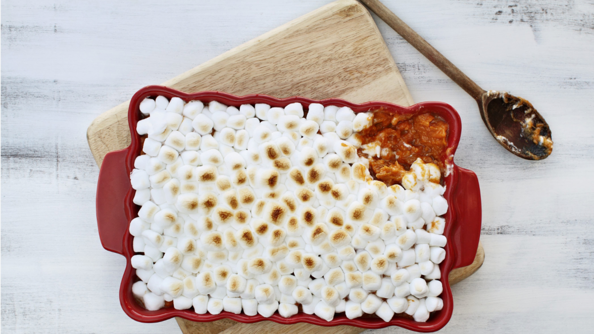 7 Foods That Prove Marshmallows Belong in More Than Hot Chocolate 1 A delightful sweet potato casserole topped with perfectly toasted marshmallows, inviting everyone to gather around for a cozy meal. Each bite promises a blend of savory and sweet, perfect for any festive occasion. Image Credit: stephaniefrey/ 123RF