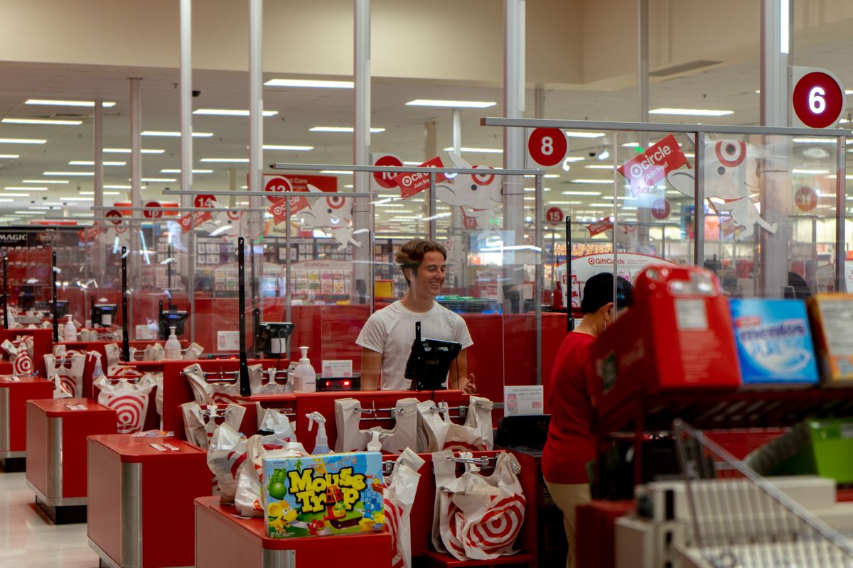 Target Is Adding 8 New Stores This Fall, and Your Next Target Run Could Be a Lot Closer 2 A bustling checkout area in a retail store, capturing the essence of modern shopping.
