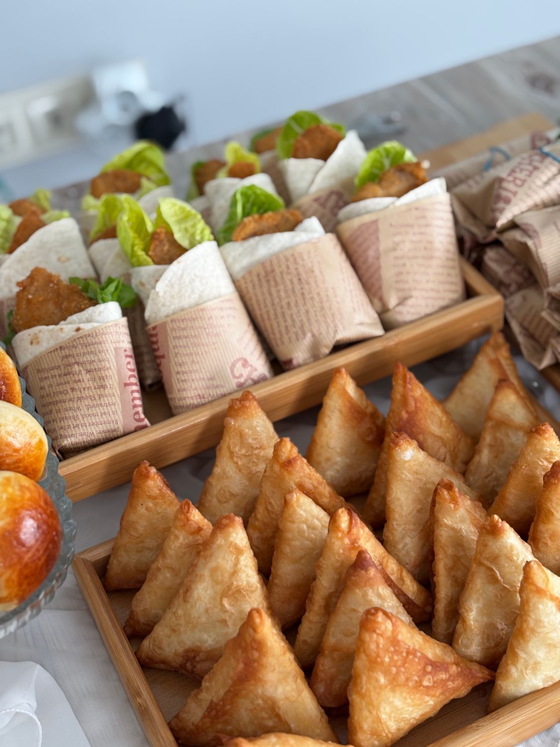 Give Taco Night a Crunchy Plot Twist With These Crispy Tofu Lettuce Wraps 2 A tempting assortment of samosas and wraps with lettuce and cutlets, perfect for party appetizers.