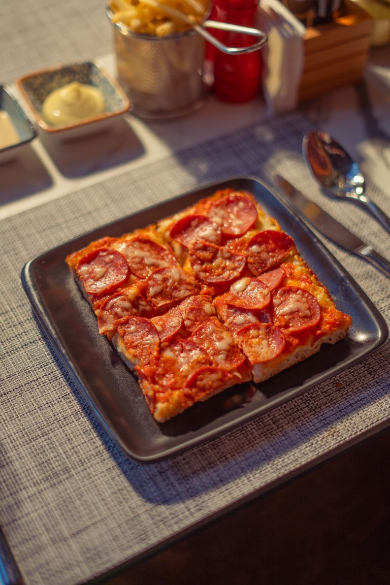 Domino’s New Detroit-Style Pizza Has Crispy Parmesan Edges, and a $6.99 Deal With a Catch