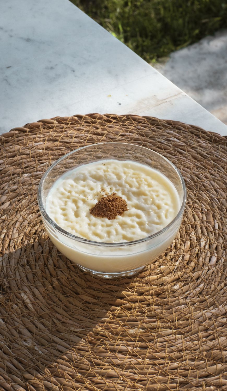 Delicious Turkish sütlaç topped with cinnamon in a glass bowl, photographed in Battalgazi, Türkiye.