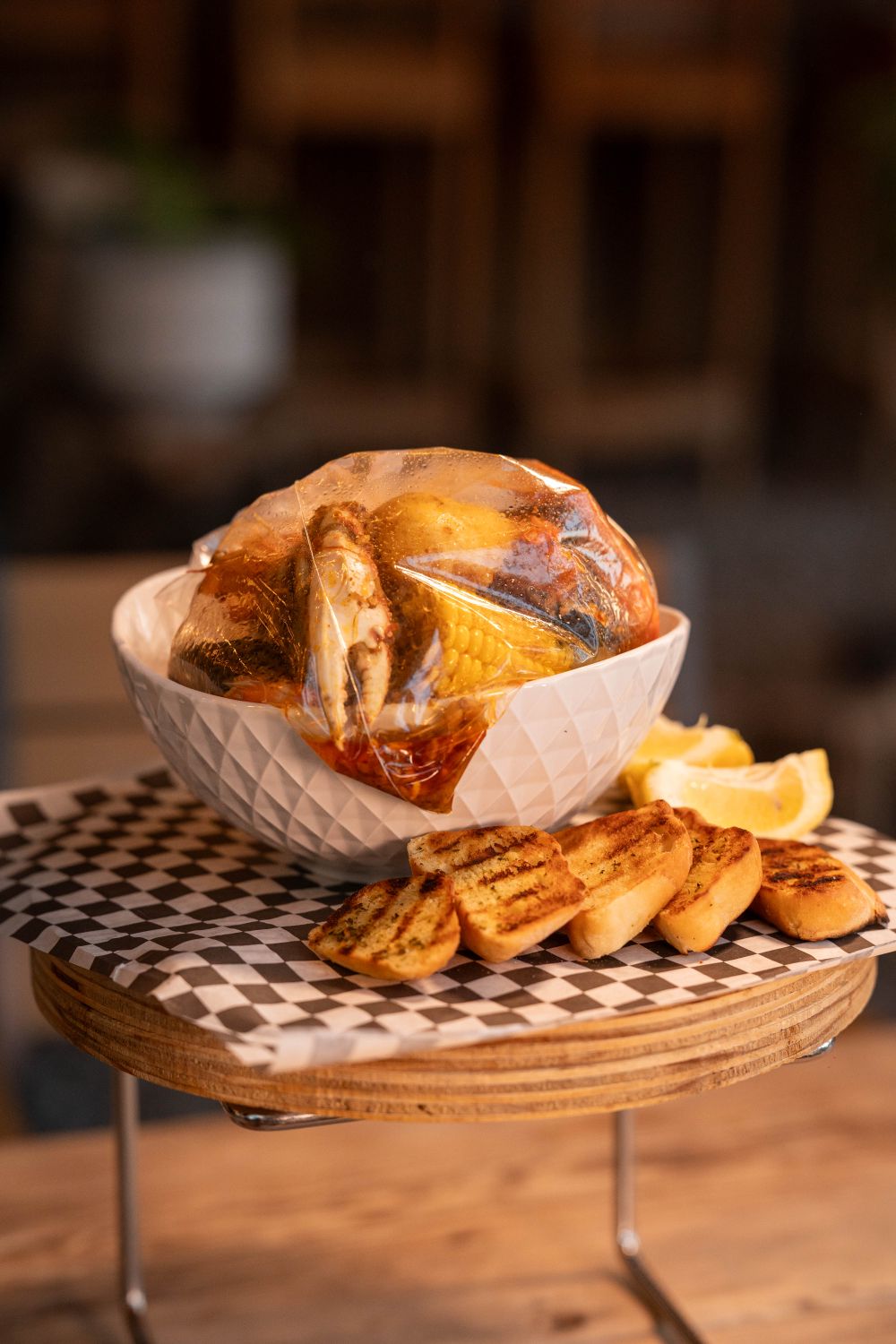 No Frogs, No Broth, All South Carolina: The Real Story Behind Frogmore Stew 1 Mouthwatering seafood boil with corn and grilled bread, served in a stylish bowl.