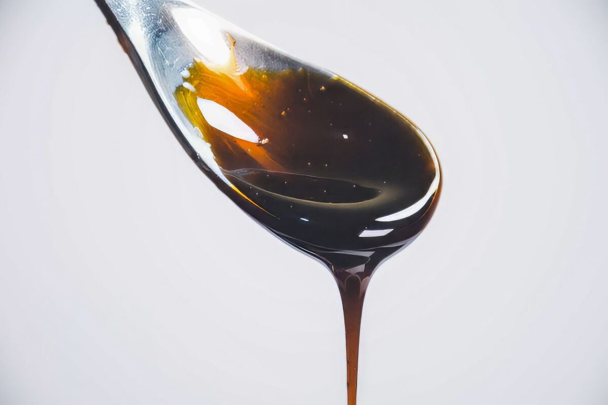 The Forgotten Pantry Ingredient That Makes Pork Chops Taste Richer and Sweeter 1 close-up-of-honey-dripping-from-spoon-