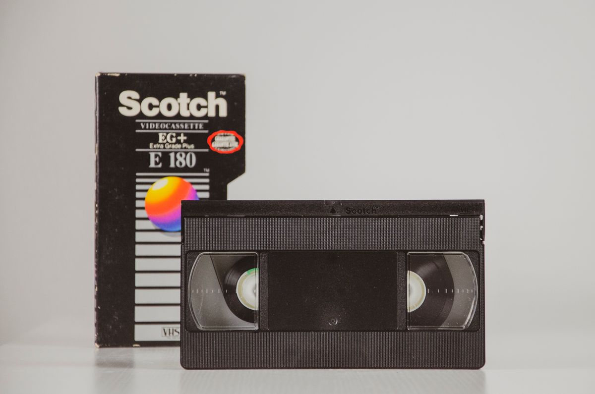 People Who Still Own a Landline Usually Have 9 Other Outdated Things in Their Homes 1 Retro VHS tape with original box, symbolizing 80s nostalgia and analog technology.